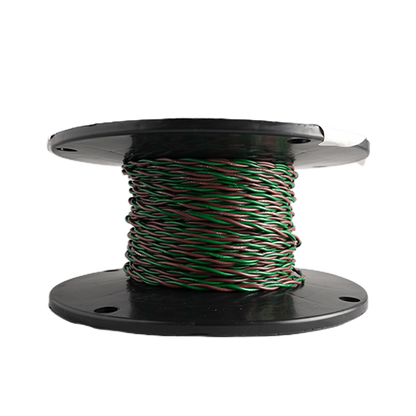 A spool of multi-colored wire, featuring green, red, and white strands twisted together, wound on a black plastic spool against a plain white background.