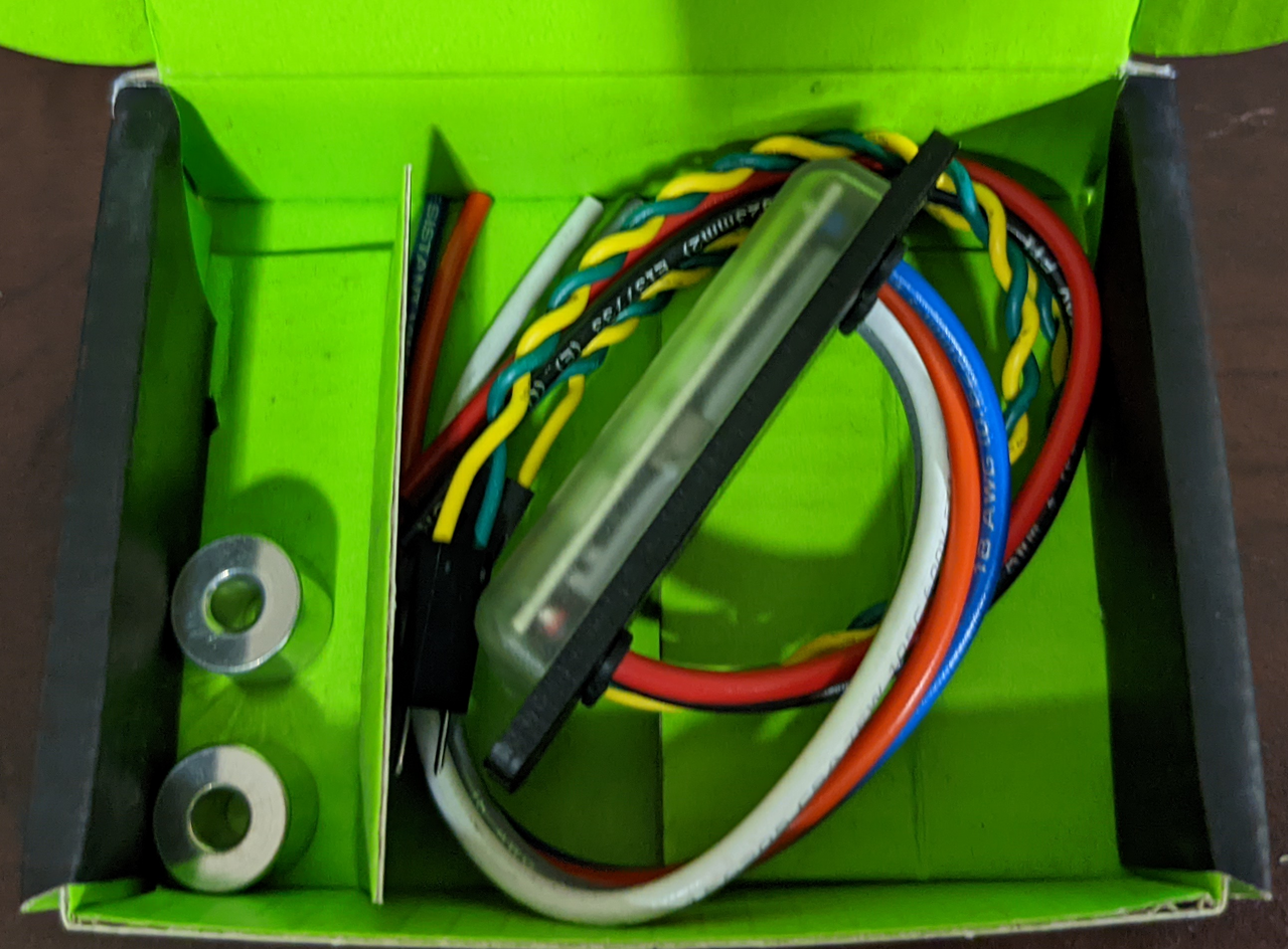 View of CANdle high-efficiency DC voltage regulator and LED controller kit in CTR Electronics box