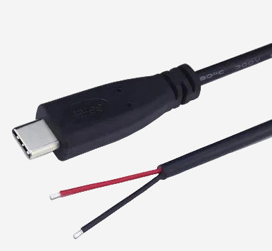 A USB Type C cable with the outer insulation removed, exposing the internal wires.