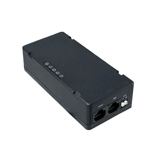 A black rectangular FIRST FRC radio with multiple ports and indicators on the front panel.